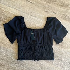 Cropped flutter sleeve black blouse